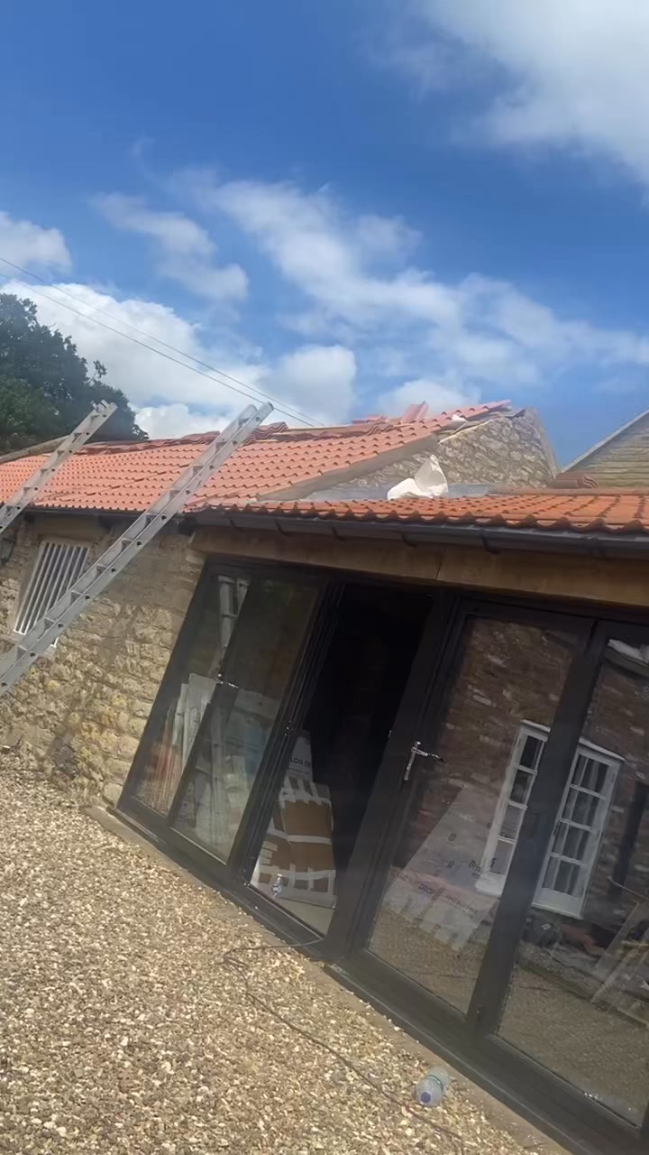 New slate roof with Velux windows by Hull & East Riding Roofing